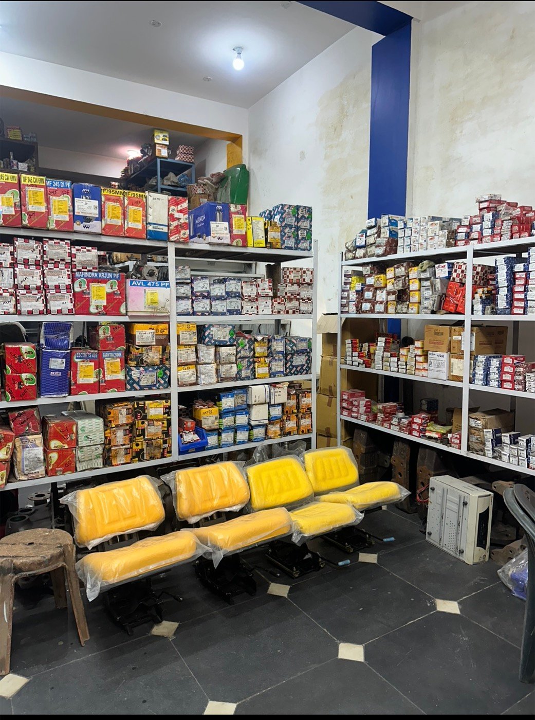 Inside Kuldeep Motors: parts inventory and tractor seats